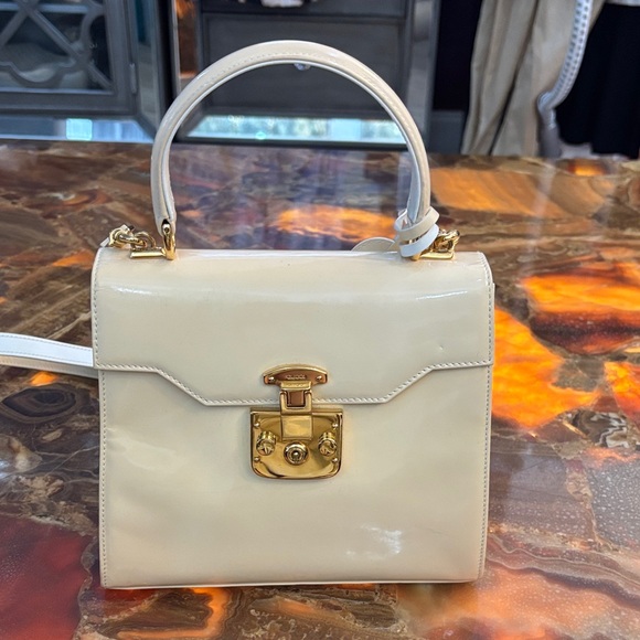 Gucci Elegant Cream patent leather Handbag with Gold Accents - Picture 1 of 13